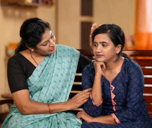 Mother talking with daughter about school
